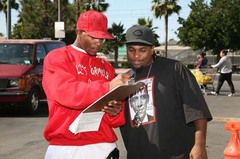 Rapper Lil Eazy-E with a self described member of the Bloods in Reds cap